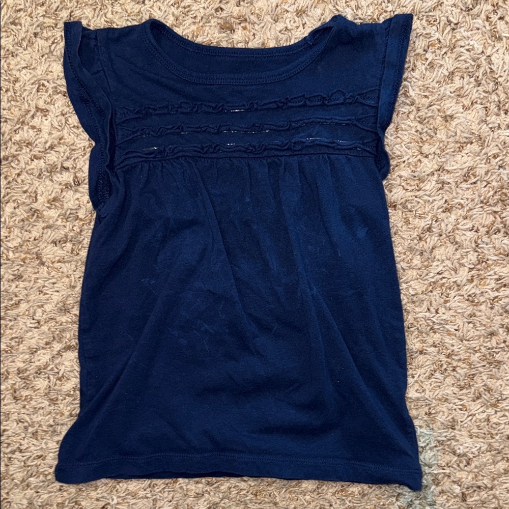 Size 5 girls Carter’s navy blue flutter sleeve top with ruffles.